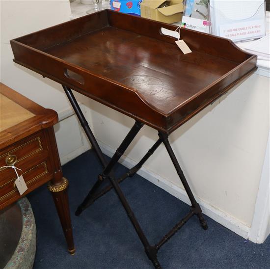 A Victorian mahogany butlers tray on folding stand W.74cm